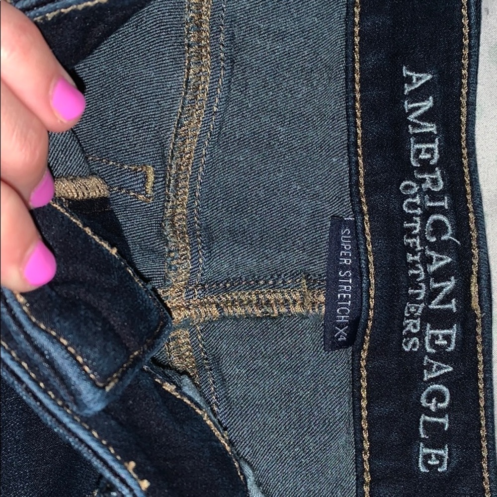 Really dark navy blue American eagle jeans